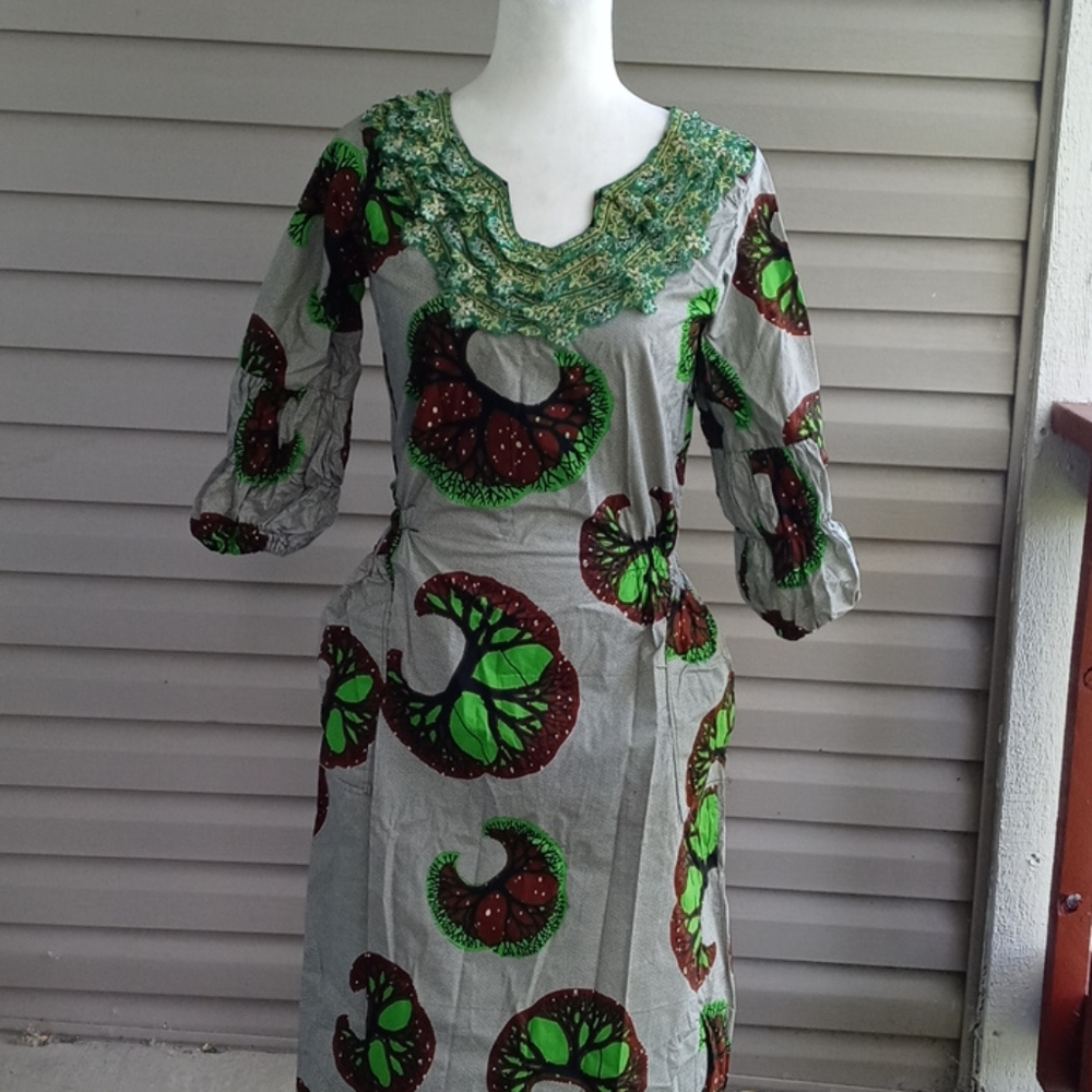 African fitted two pocket gown